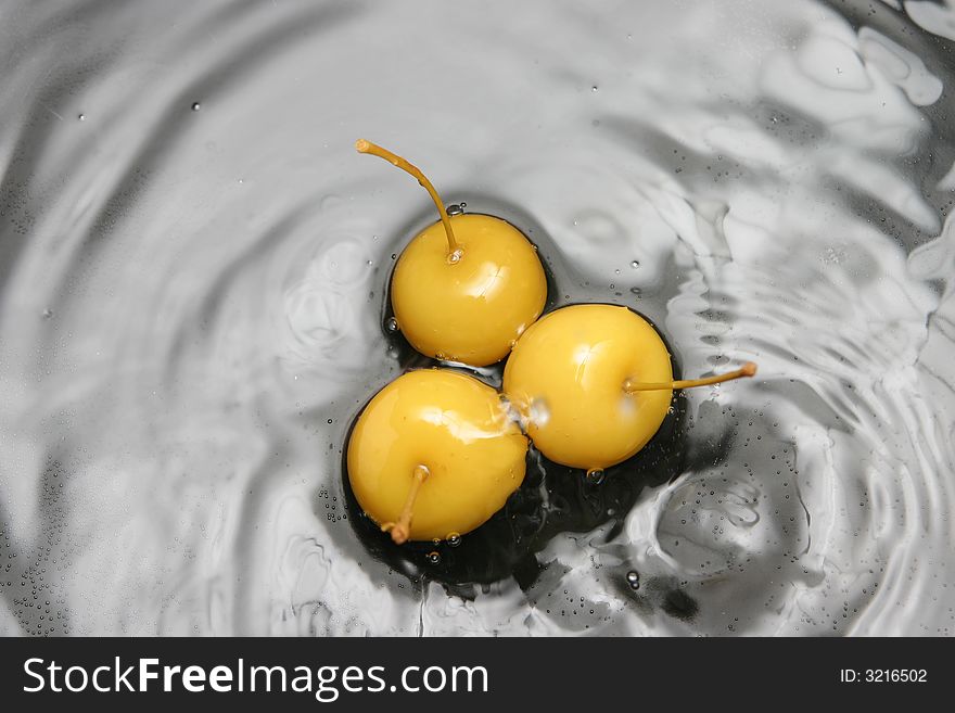 Image of three fresh fruits in water. Image of three fresh fruits in water