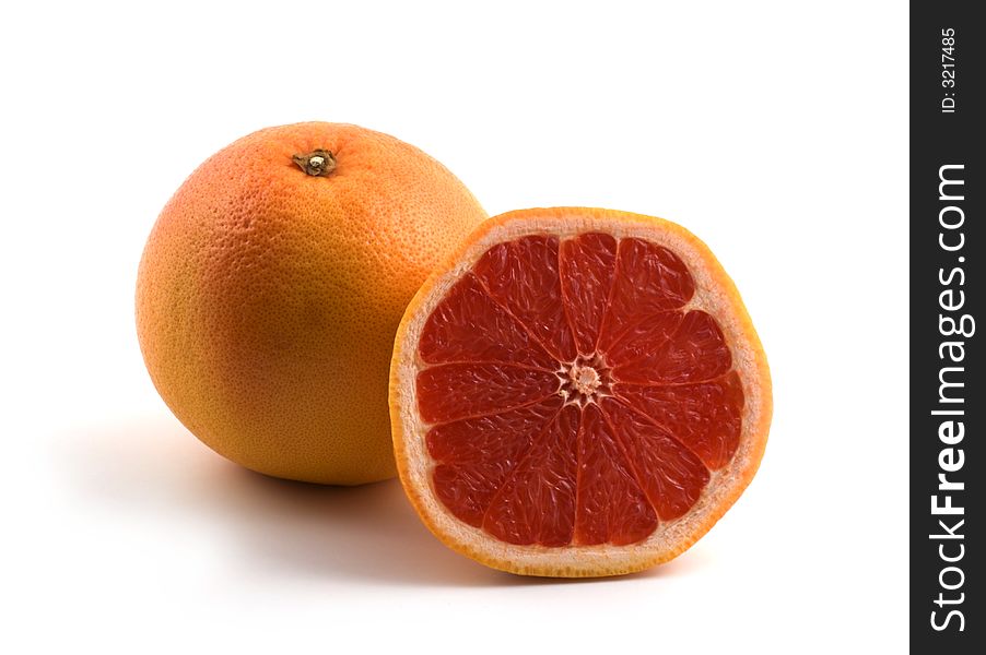 Red grapefruit on white background. Red grapefruit on white background