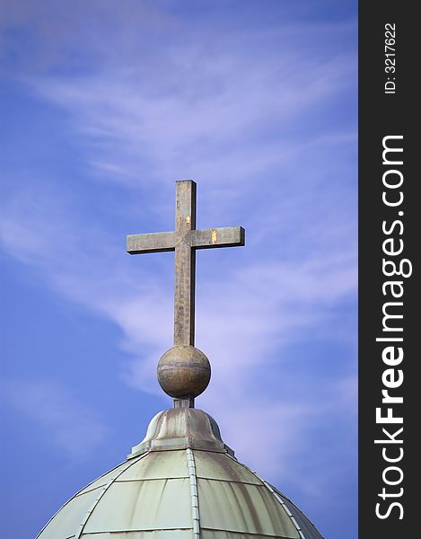 Cross on sky background religion