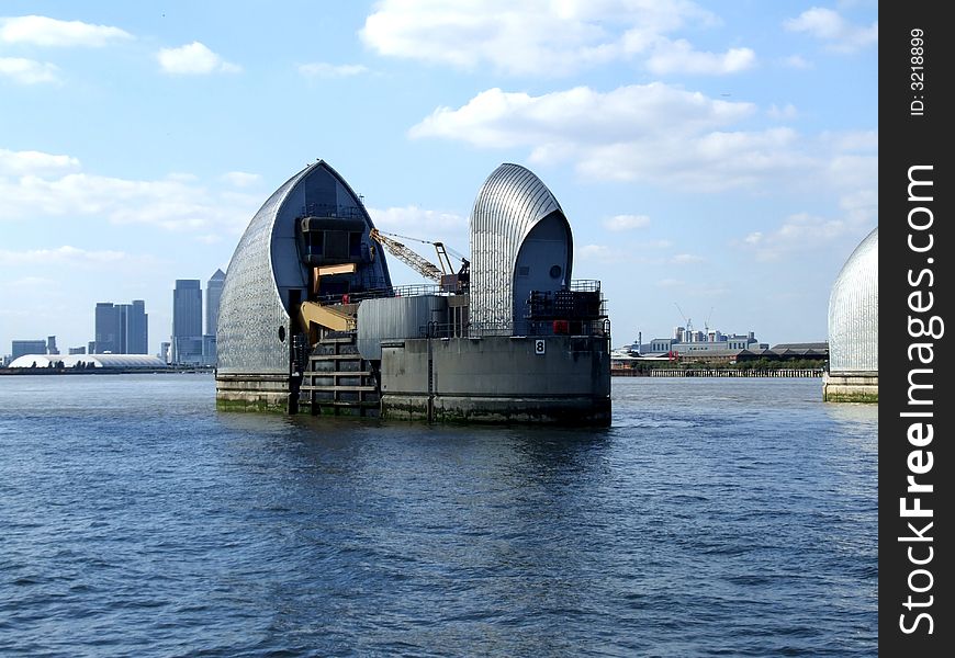 An image of the tidal protector the Thames Barrier that protects London from environmental flooding. An image of the tidal protector the Thames Barrier that protects London from environmental flooding.