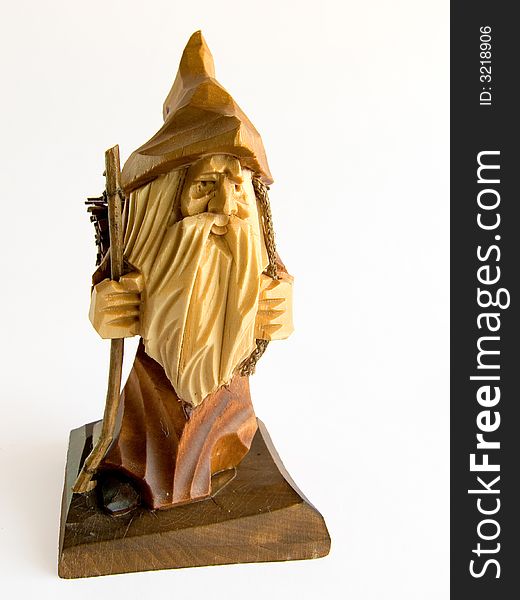 Small wooden figurine mountains ghost. Working path.