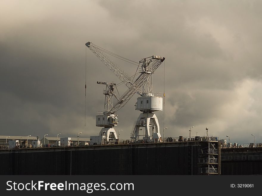 Two cranes on a repair ship