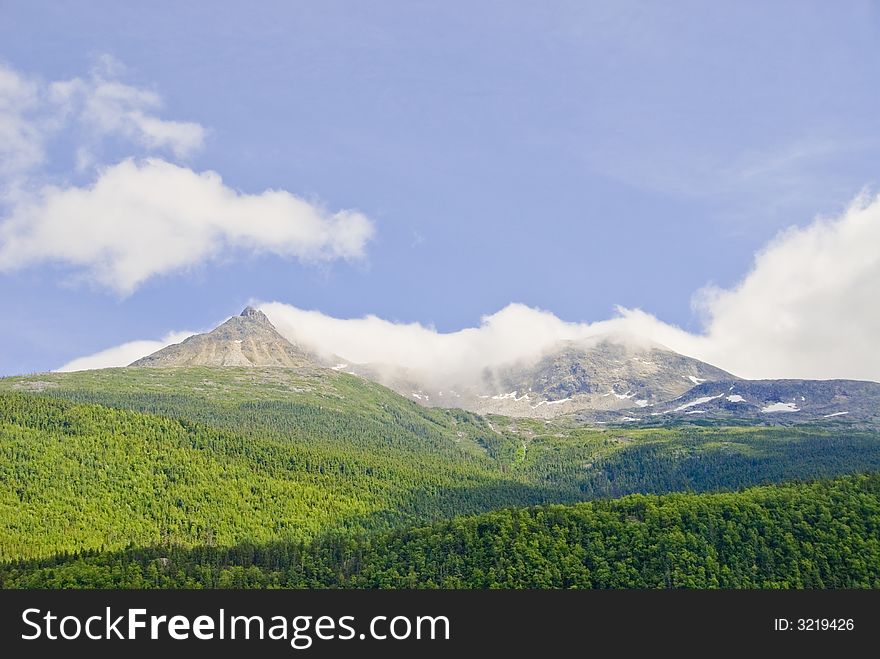 Mountains and clouds in Alaska. Mountains and clouds in Alaska