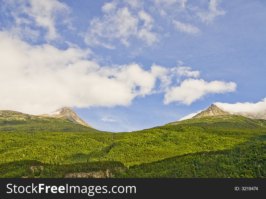 Mountains and clouds in Alaska. Mountains and clouds in Alaska