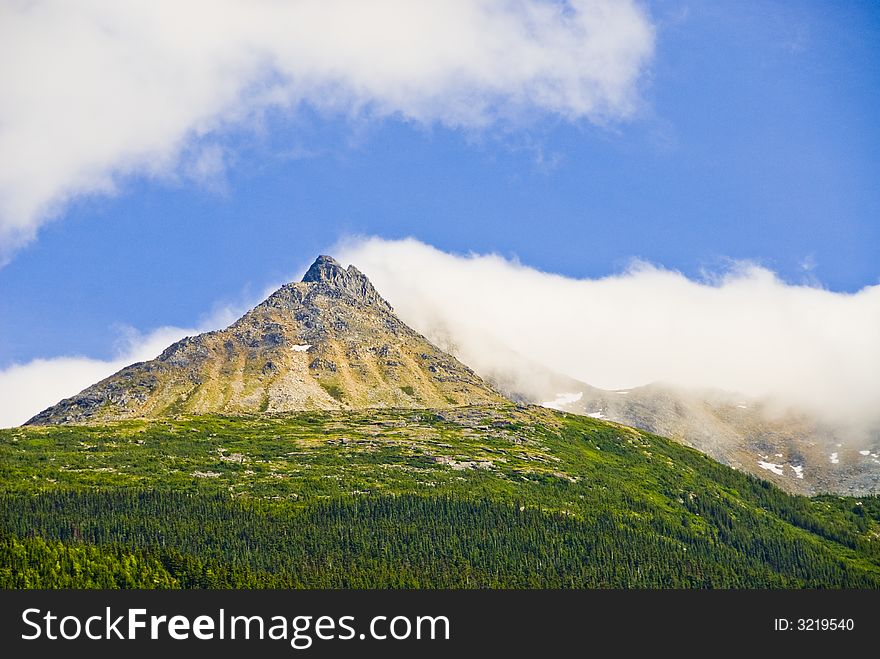 Mountains and clouds in Alaska. Mountains and clouds in Alaska