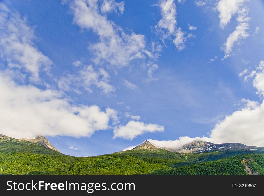 Mountains and clouds in Alaska. Mountains and clouds in Alaska