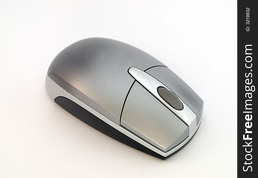 A grey bluetooth computer mouse