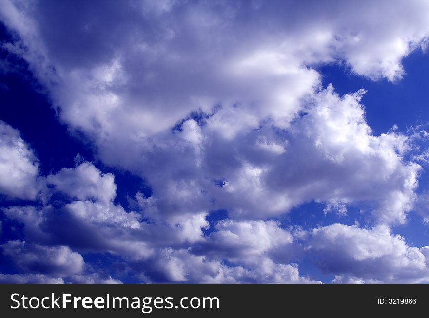 Blue sky with clouds. Positive, straight forward.