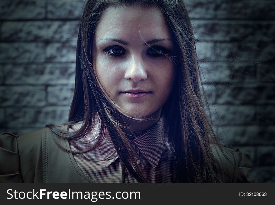 Portrait Of Serious Beautiful Girl Outdoor