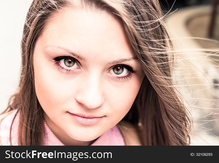 Portrait Of Serious Beautiful Girl Outdoor