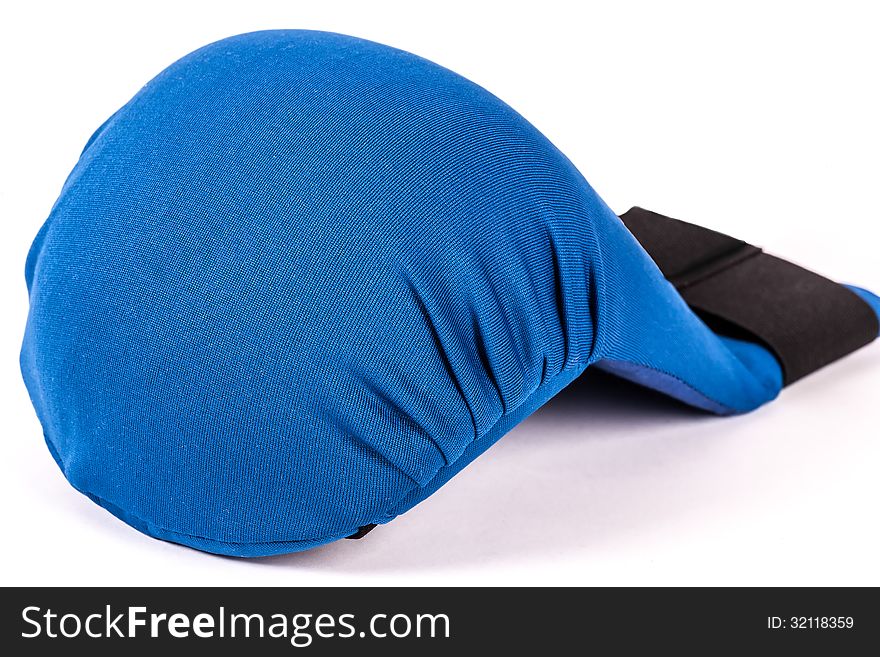 Blue karate gloves on white background with black slip