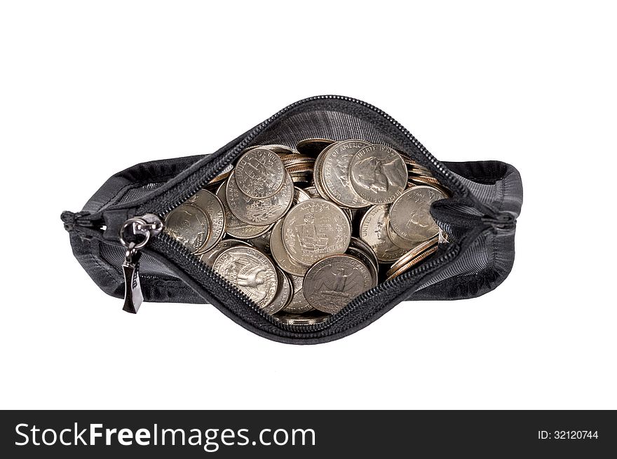 Horizontal and overhead shot of coins in a coin purse. Isolated on a white background. Horizontal and overhead shot of coins in a coin purse. Isolated on a white background.