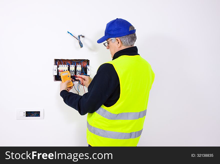 Electrician at work in a building site