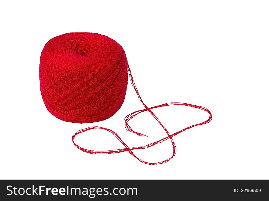 Ball of deep red yarn isolated