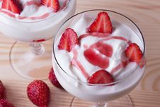 Strawberry Yogurt On A Wooden Background Stock Images