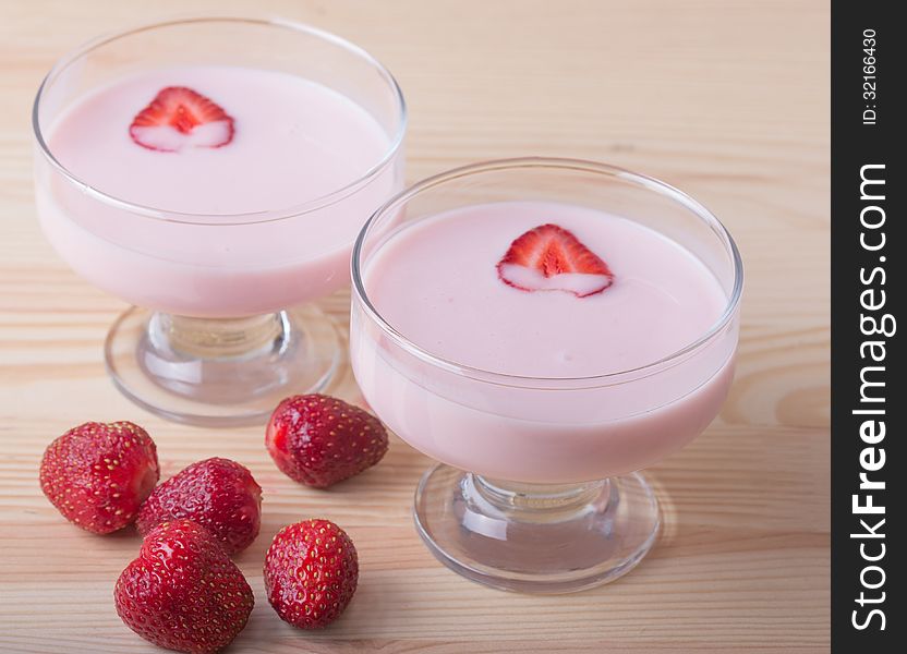 Strawberry dessert with yogurt and strawberries in a glass. Strawberry dessert with yogurt and strawberries in a glass