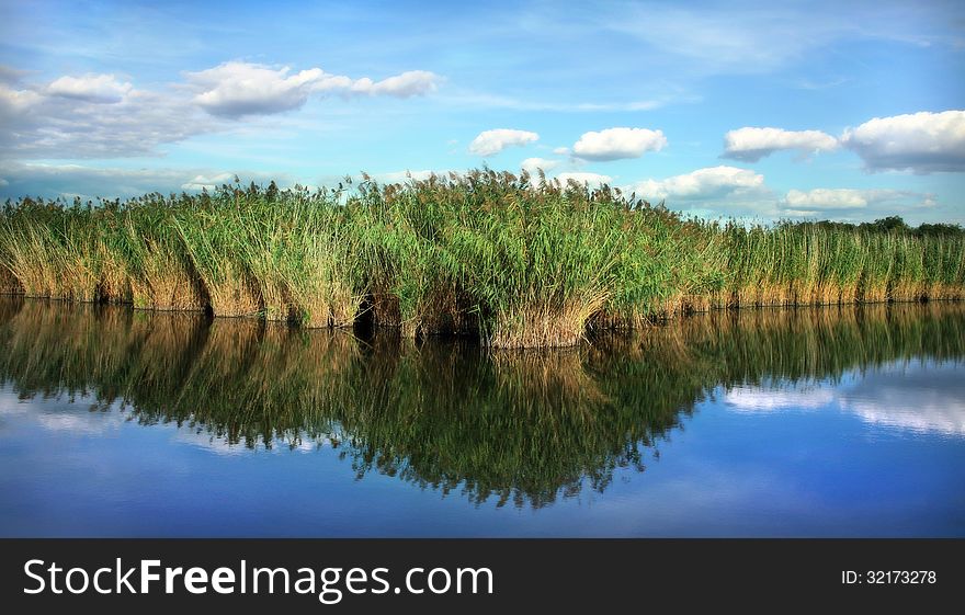 Landscape With Water And Clouds