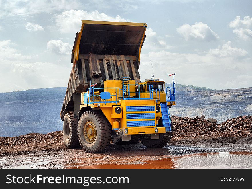 Unloading truck in a career of iron ore