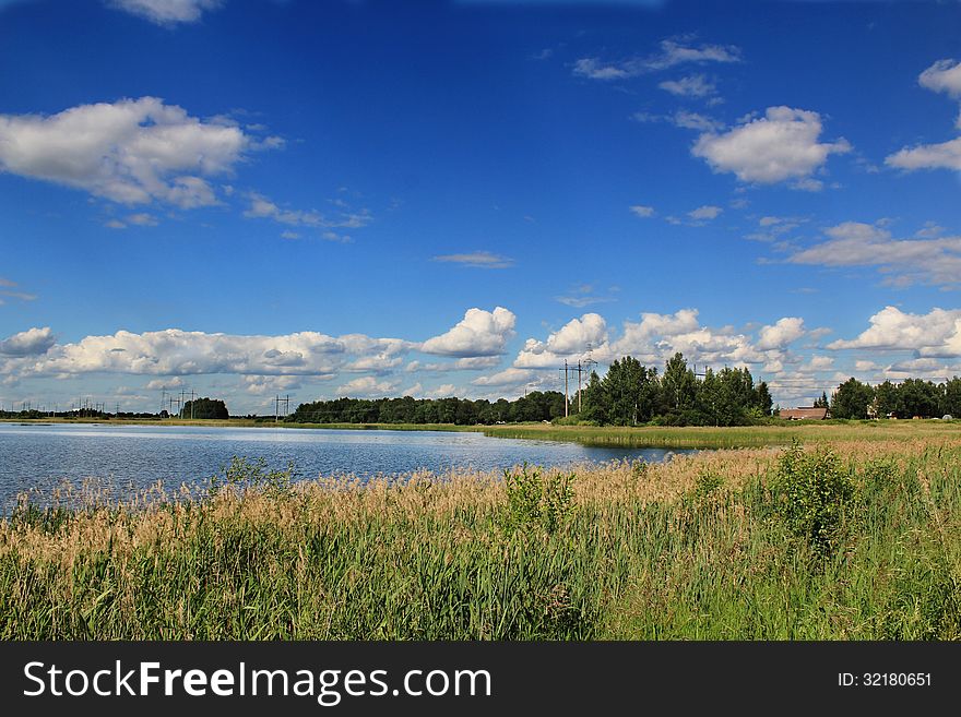 Landscape of the lake in the summer, blue sky