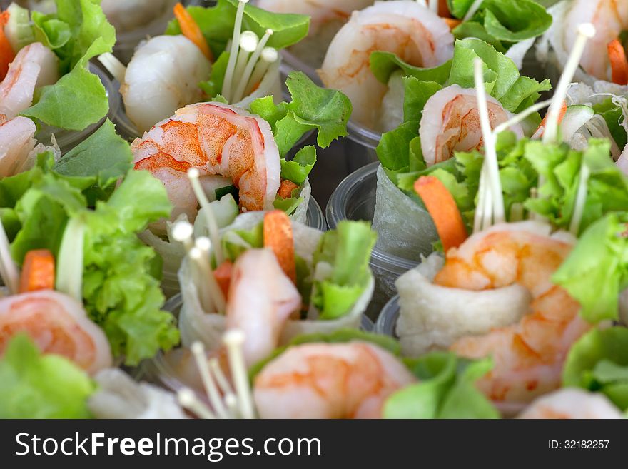 Group of shrimp crepe green salad