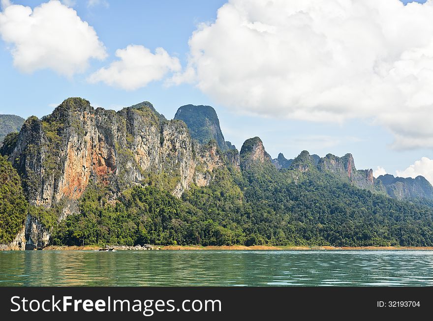 Beautiful mountain surrounded by water, Natural attractions in Ratchapapha dam at Surat Thani province, Guilin of Thailand. Beautiful mountain surrounded by water, Natural attractions in Ratchapapha dam at Surat Thani province, Guilin of Thailand.