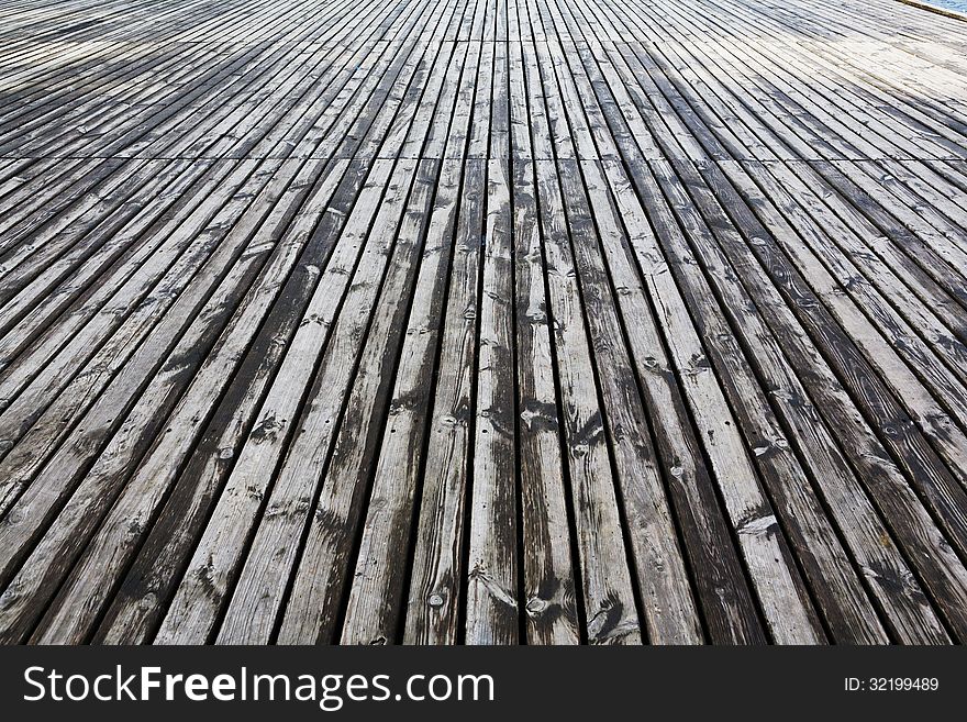 Grungy gray aged floor natural wood background. Grungy gray aged floor natural wood background