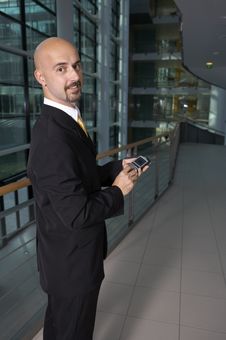 Business Man Holding PDA Stock Photo