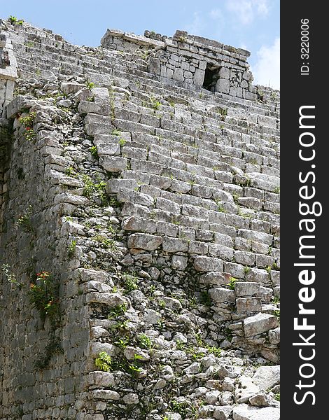 Large Mayan ruins at the site of Chichen Itza in the Yucatan Region of Mexico. These steps have been partially restored