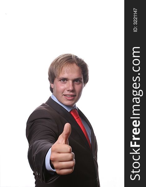 Young business man showing thumb up isolated