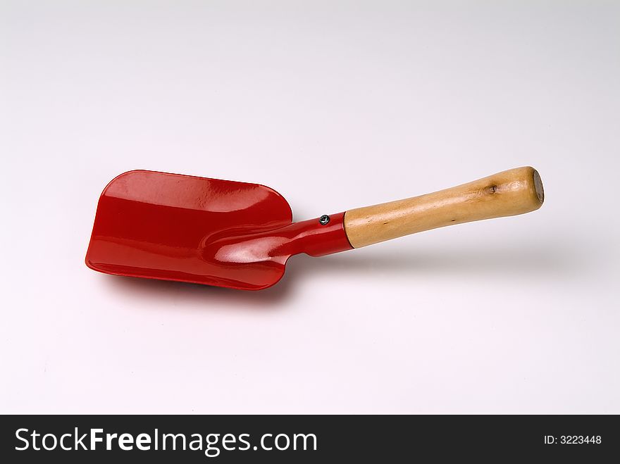 Red shovel kids garden tool