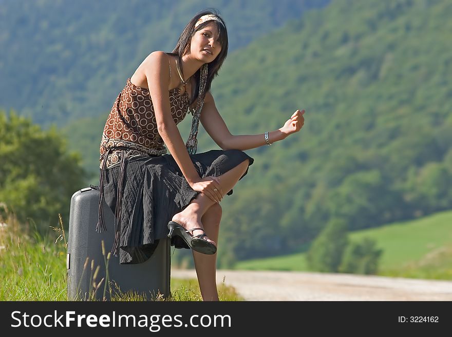 Woman Making Of Hitch-hiking