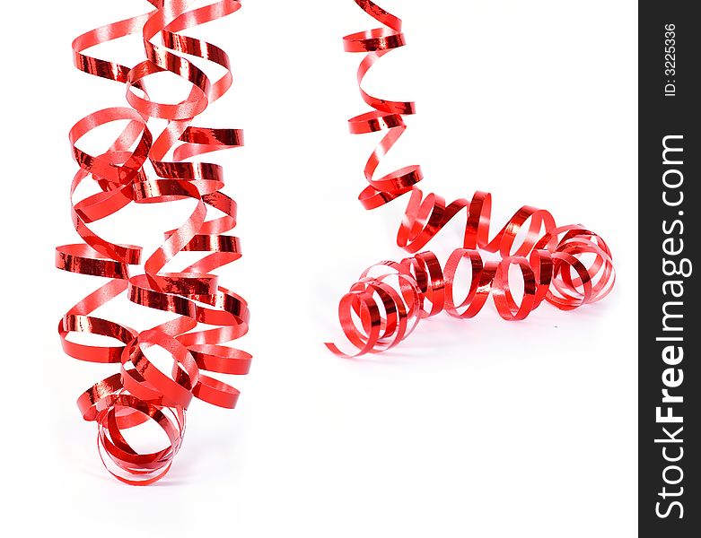 Set of red curly ribbons on white