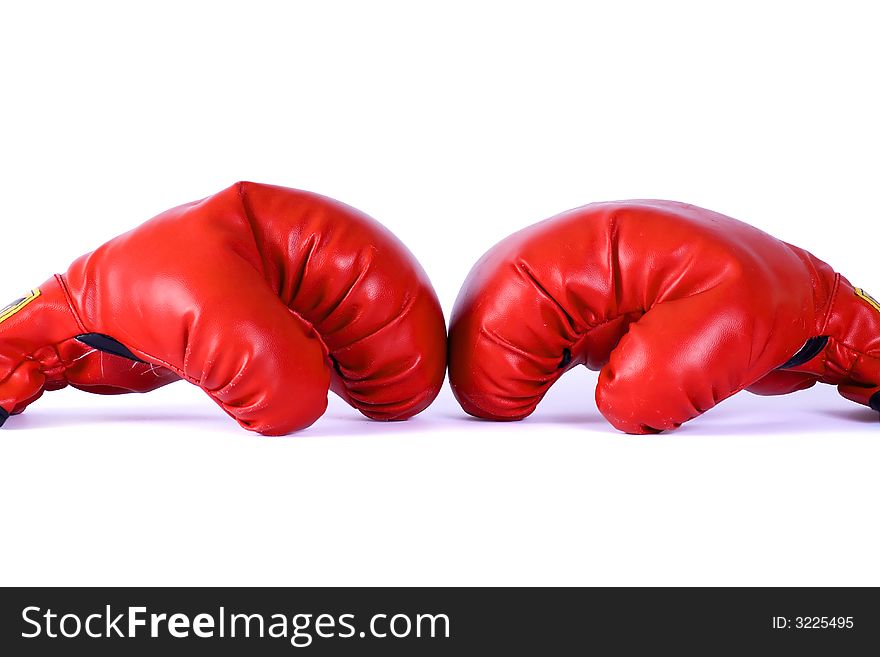 Red boxing gloves on white