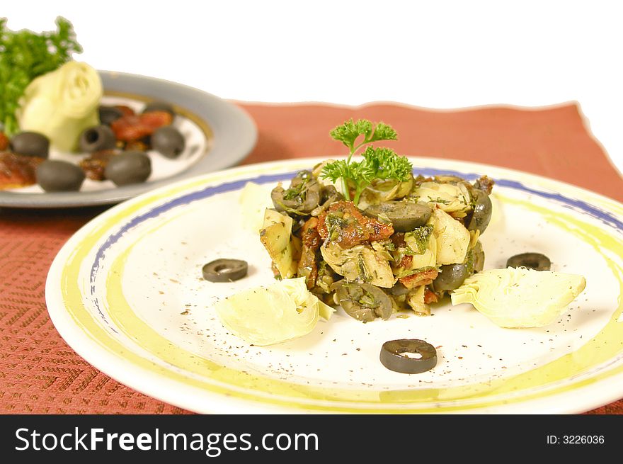 Vegetarian dish with sundried tomatoes and artichocks