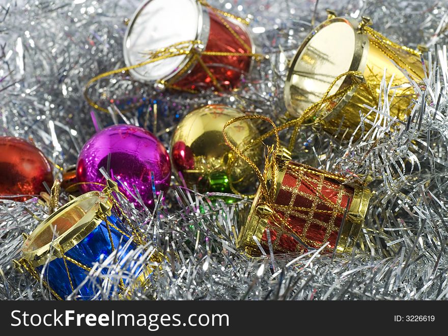 Heap of colorful christmas tree decorations of different types