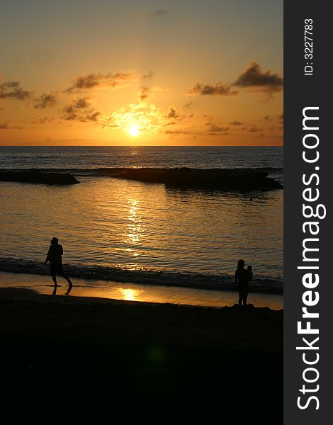 Beach Silhouettes At Sunset