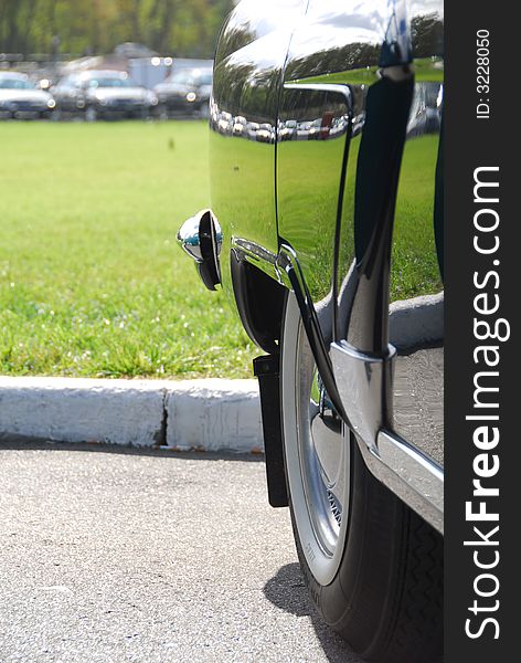 Side view of retro car, near edge of road. Side view of retro car, near edge of road