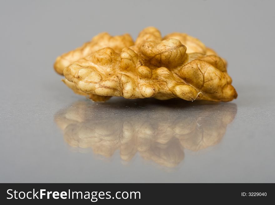 Walnuts close up isolated with reflection