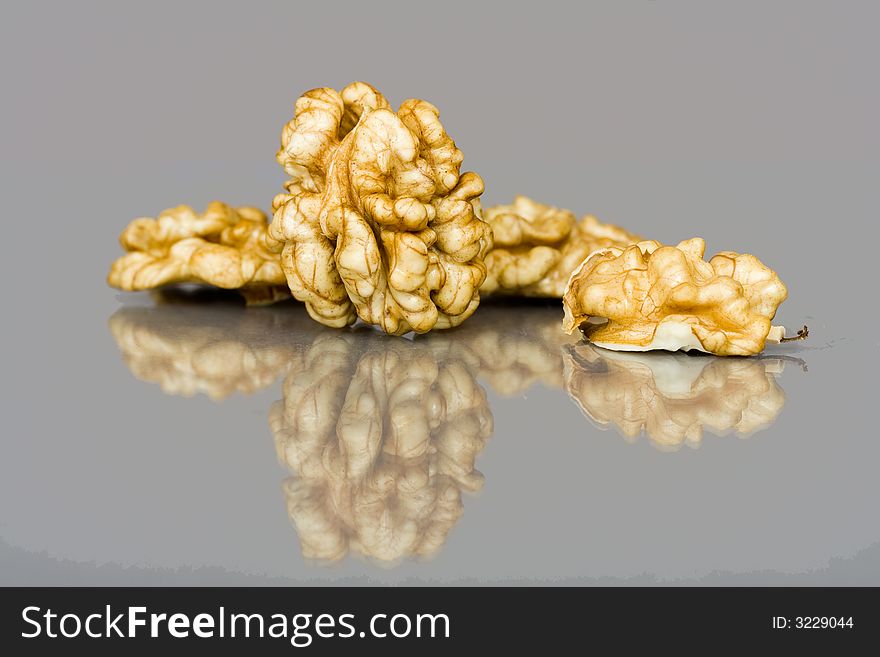 Walnuts close up isolated with reflection