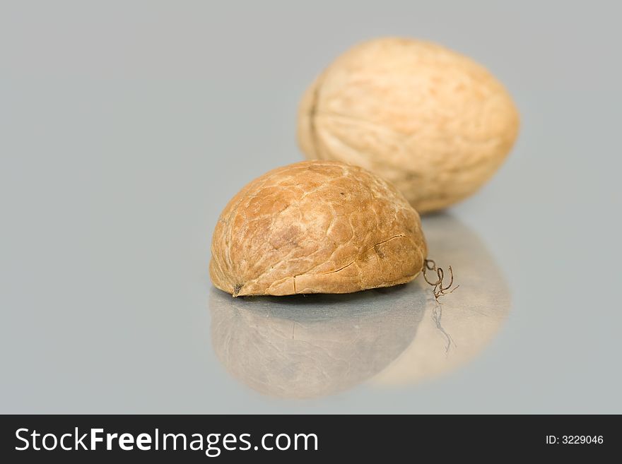Walnuts close up isolated with reflection