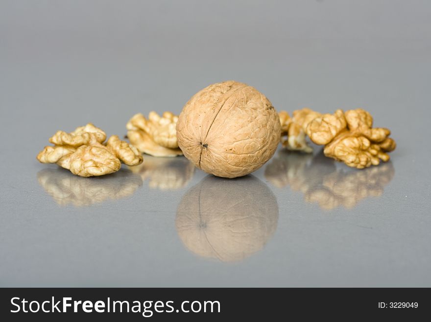 Walnuts close up isolated with reflection