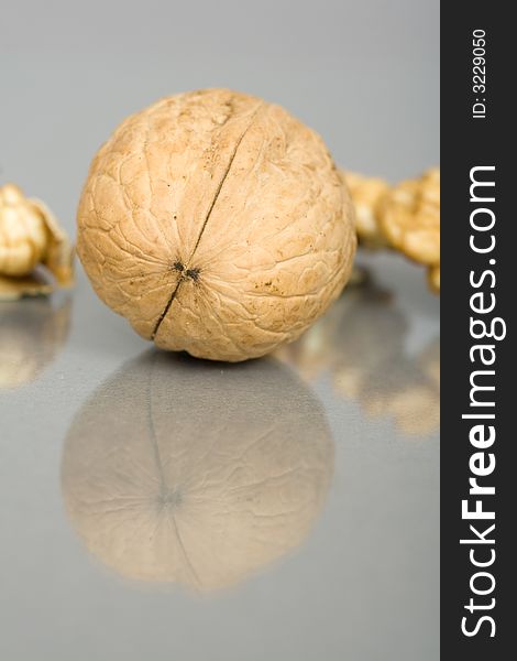 Walnuts close up isolated with reflection