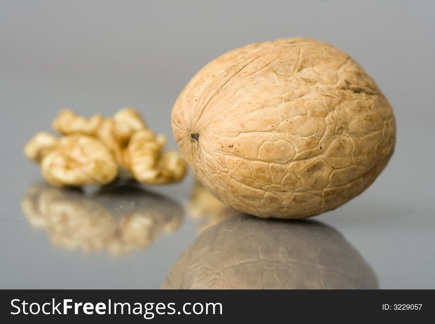 Walnuts close up isolated with reflection