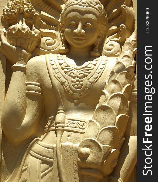 Artwork carved into a Buddhist temple in Sri Lanka. Artwork carved into a Buddhist temple in Sri Lanka