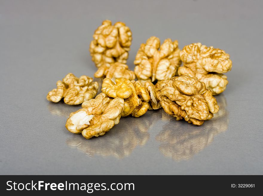 Walnuts close up isolated with reflection