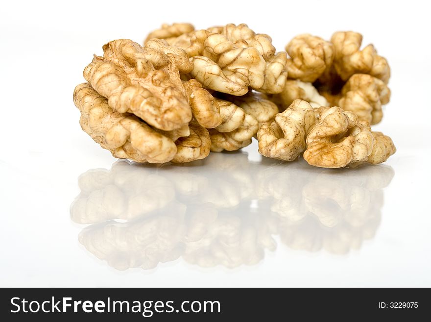 Walnuts close up isolated with reflection