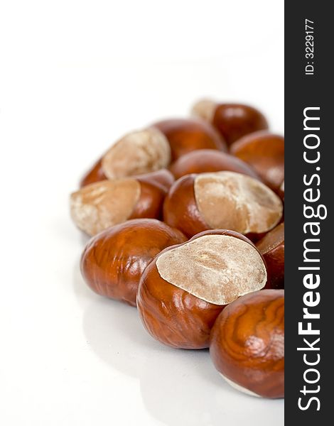 Chestnuts close up isolated with reflection