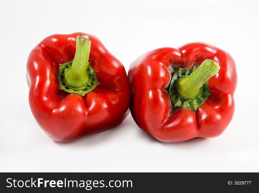 Two harvested red peppers in the Mediterranean