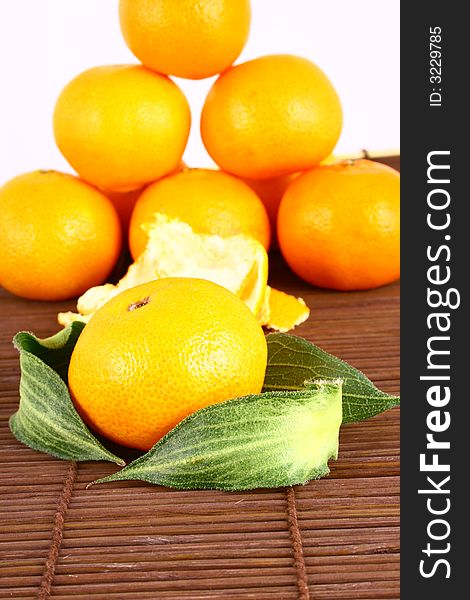 Fresh tangerine and orange isolated on white background