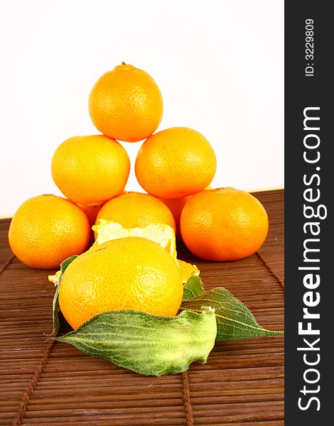 Fresh tangerine and orange isolated on white background